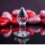 Анальная пробка с красным кристаллом Adam & Eve Red Heart Gem Glass Plug Small, прозрачная - Фото №7