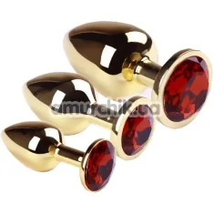 Набір з 3 анальних пробок з червоним кристалом SWAROVSKI Gold Ruby, золотий - Фото №1