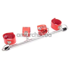 Фиксаторы для рук и ног DS Fetish Metal Hand And Ankle Spreader Bar, красные - Фото №1